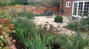 Sloping family garden in Hertfordshire