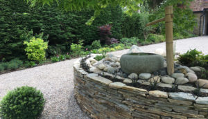 North London garden design with paddle-stone wall by Amanda Broughton