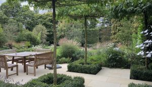 Hertfordshire garden design with shaded terrace in contemporary new build garden design