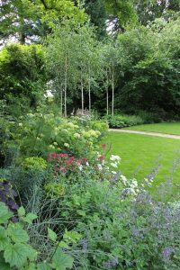 Beautiful borders in traditional country garden by Amanda Broughton Garden Design